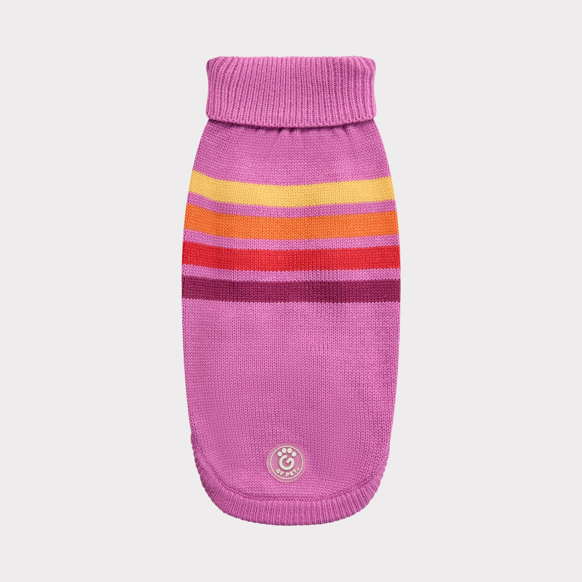 Pink dog sweater with colorful stripes on a light gray background